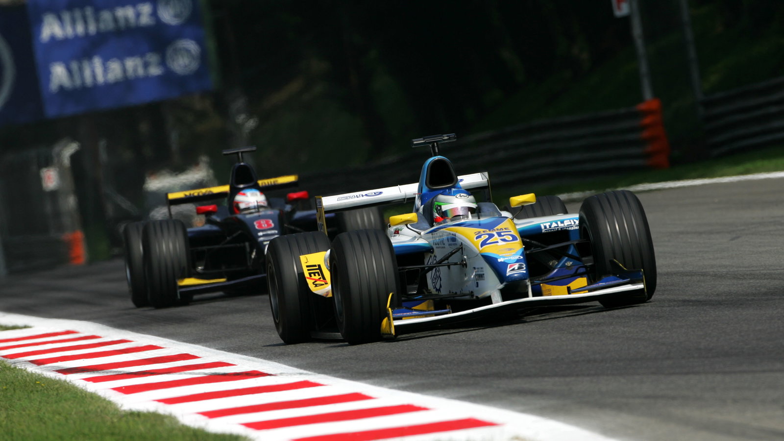 Ferdinando Monfardini leads Adam Carroll at Monza