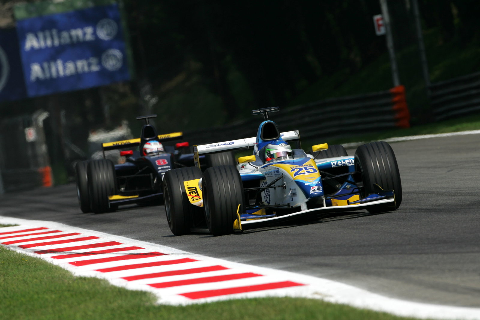 Ferdinando Monfardini leads Adam Carroll at Monza