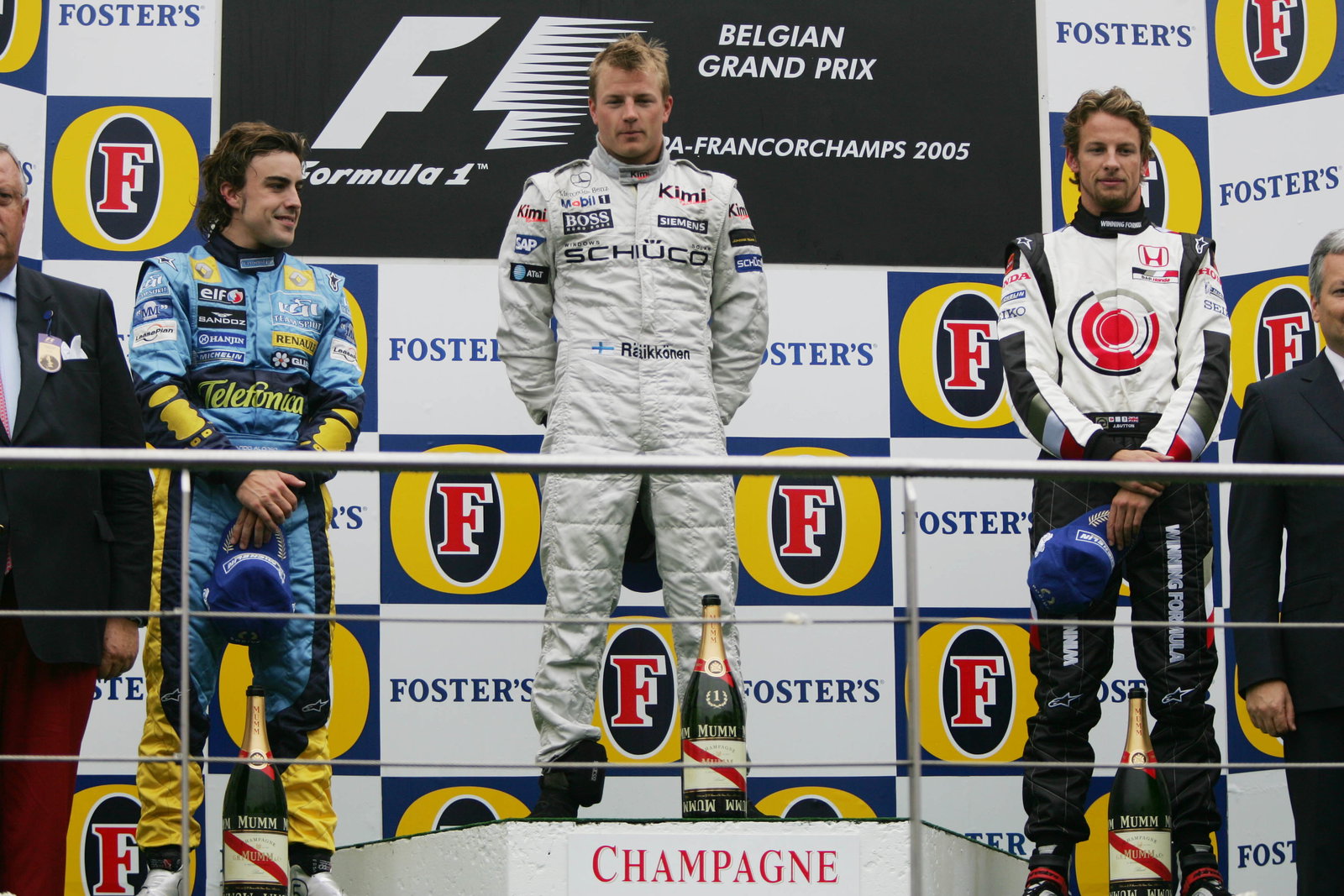 Belgian GP winner, Kimi Raikkonen on the podium with Fernando Alonso [2nd] and Jenson Button [3rd]
