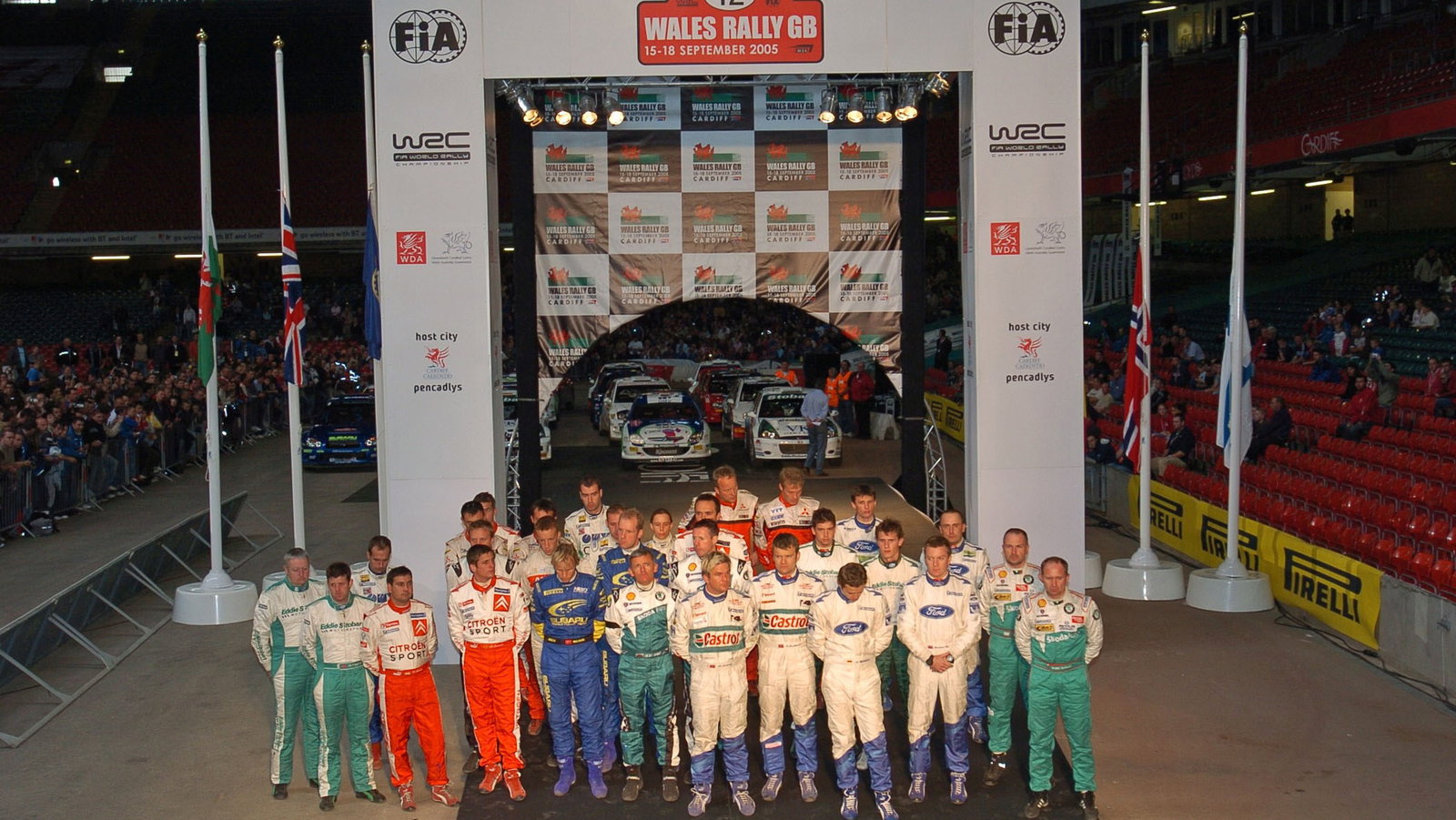 Drivers at the finish of the Rally GB observe a one minute`s silence for Michael Park