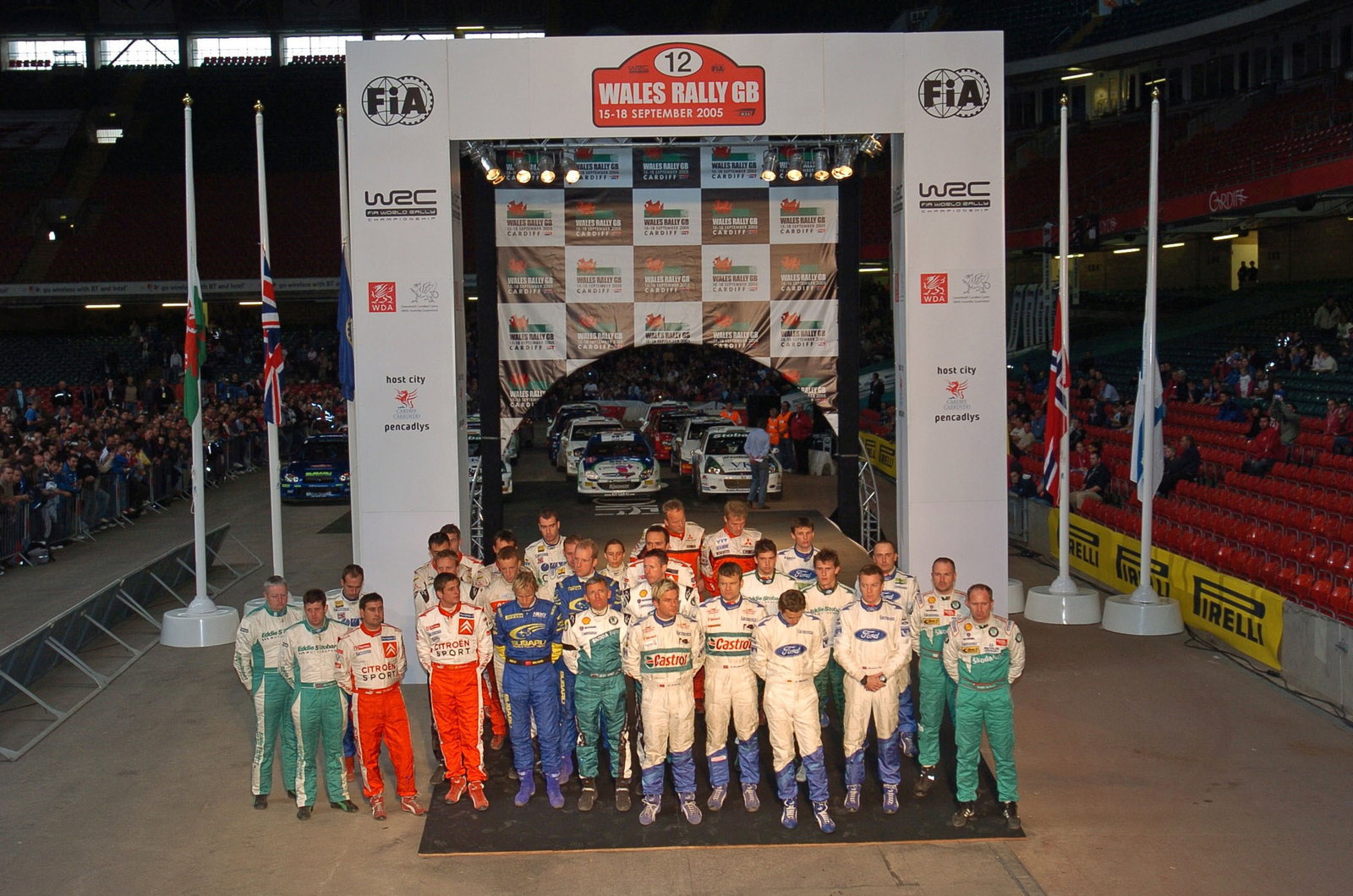 Drivers at the finish of the Rally GB observe a one minute`s silence for Michael Park