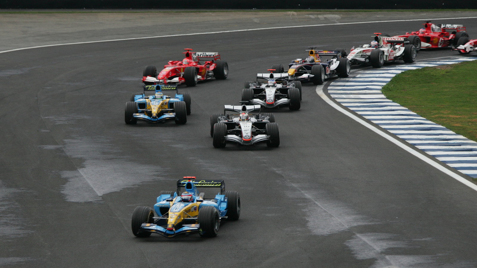 Fernando Alonso leads at the start of the Brazilian Grand Prix