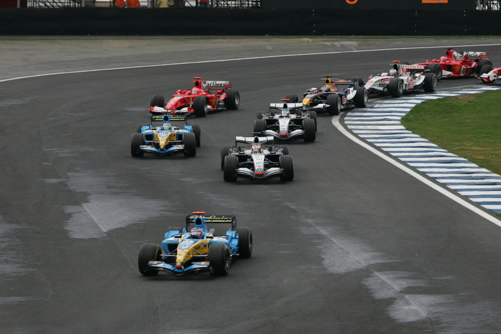 Fernando Alonso leads at the start of the Brazilian Grand Prix