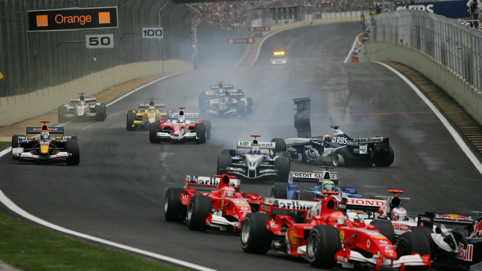 David Coulthard and Antonio Pizzonia crash at the start of the Brazilian Grand Prix