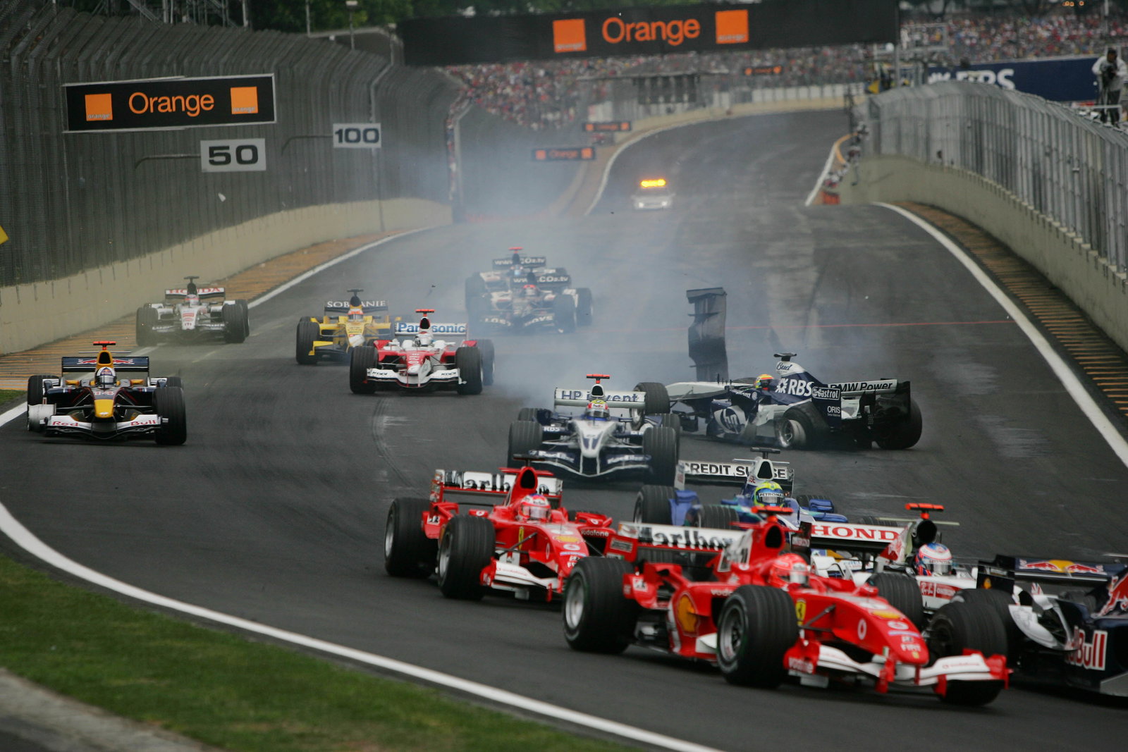 David Coulthard and Antonio Pizzonia crash at the start of the Brazilian Grand Prix