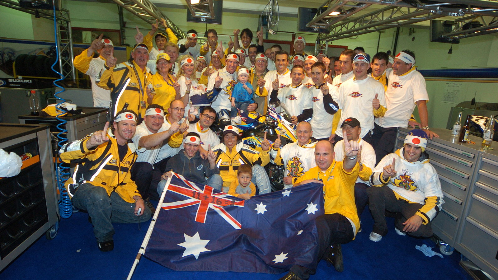 Corser Celebrates World Championship With Alstare Suzuki Team, Imola WSBK Race2, 2005