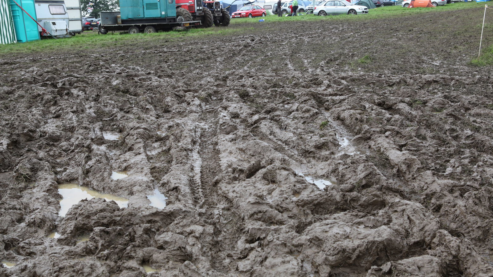 08.07.2012- Wet and muddy car parks and camp sites at the circuit