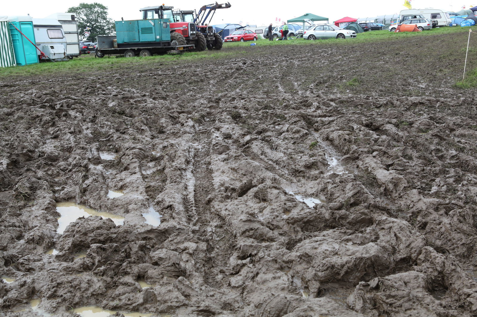 08.07.2012- Wet and muddy car parks and camp sites at the circuit