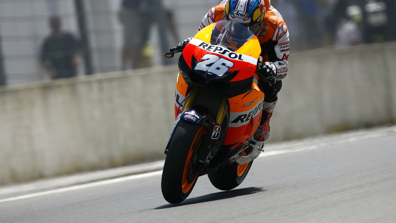 Pedrosa flat out, both wheels in air, Italian MotoGP 2012
