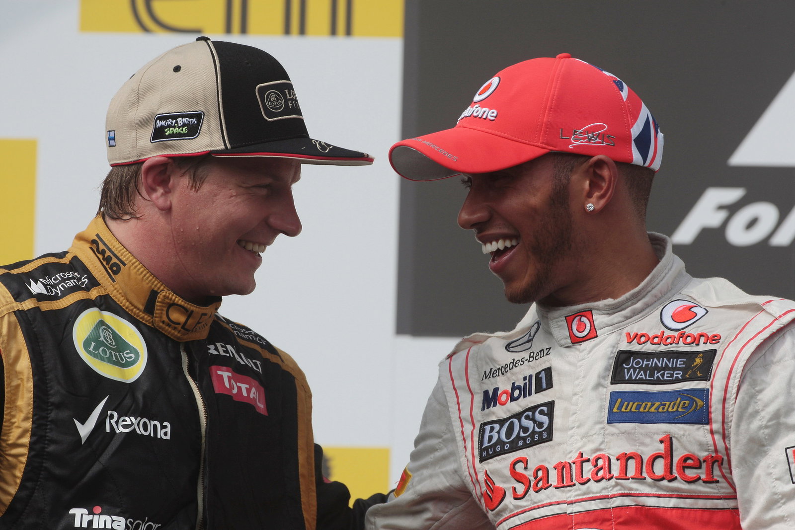 29.07.2012- Race, 2nd position Kimi Raikkonen (FIN) Lotus F1 Team E20 and Lewis Hamilton (GBR) McLar