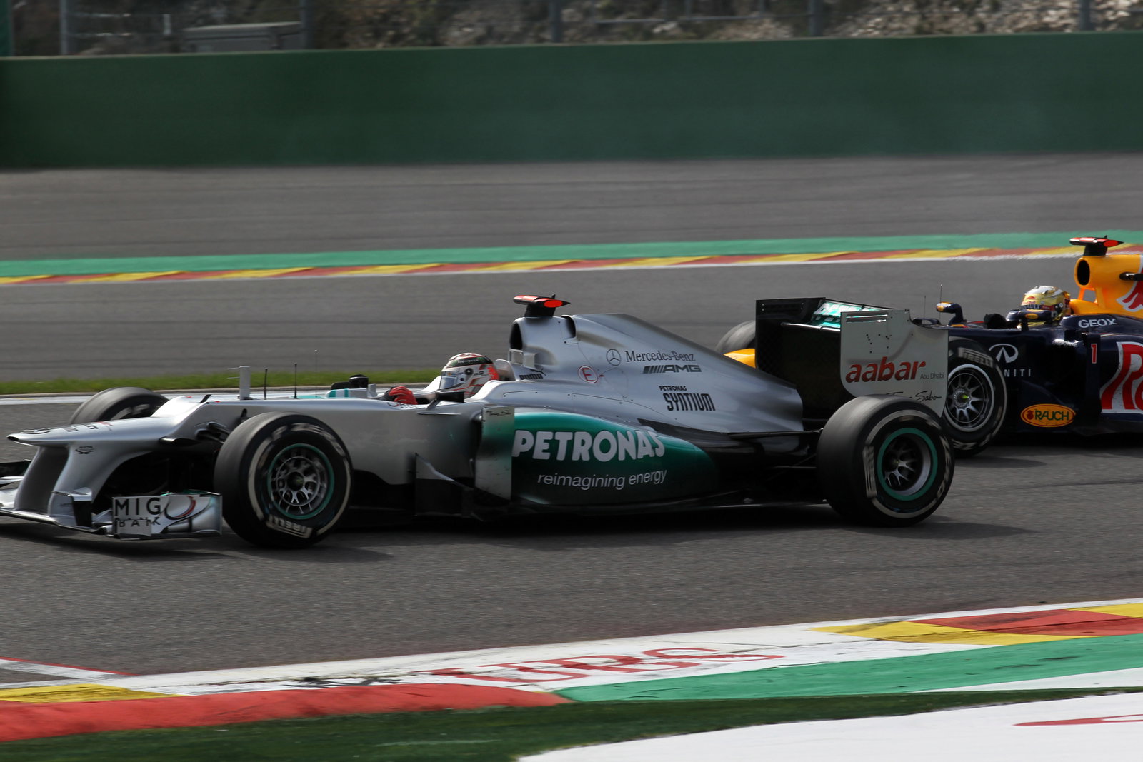 02.09.2012- Race, Michael Schumacher (GER) Mercedes AMG F1 W03 and Sebastian Vettel (GER) Red Bull R