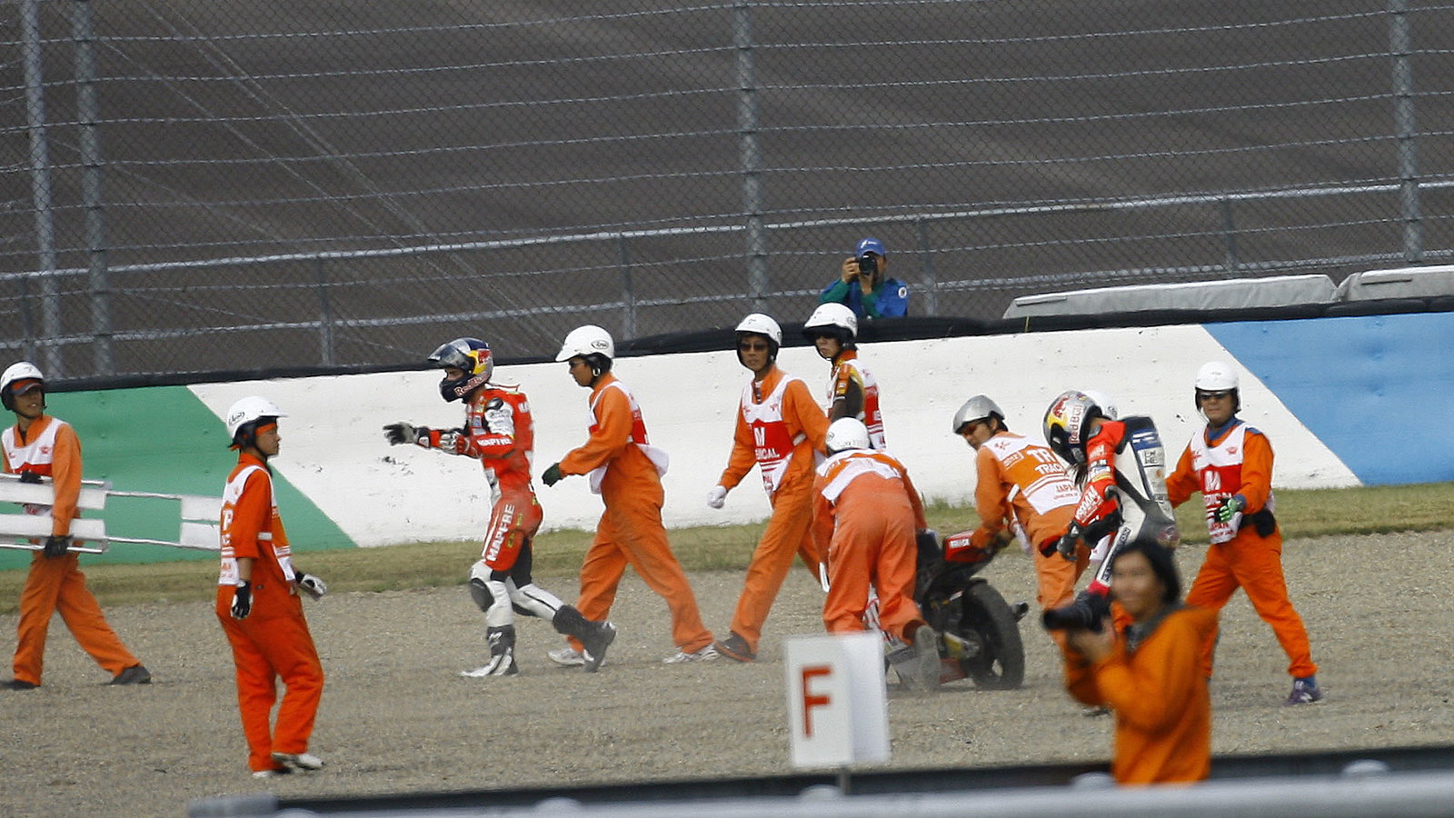 Folger and Salom after crash, Moto3 race, Japan MotoGP 2012