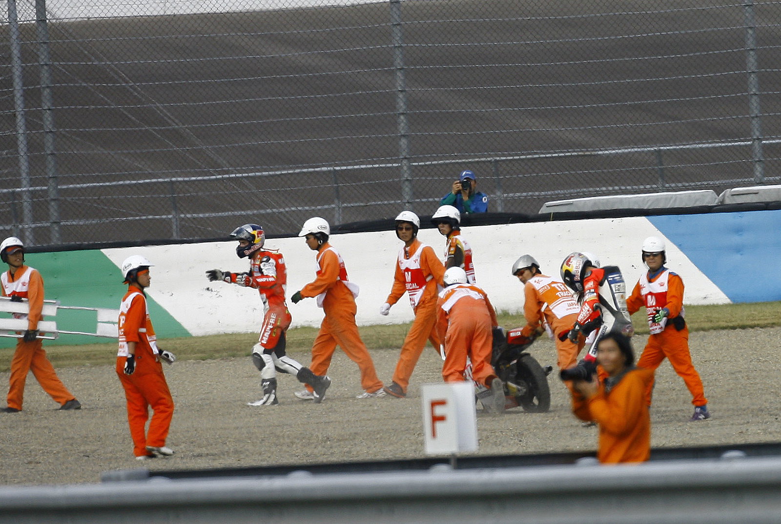 Folger and Salom after crash, Moto3 race, Japan MotoGP 2012