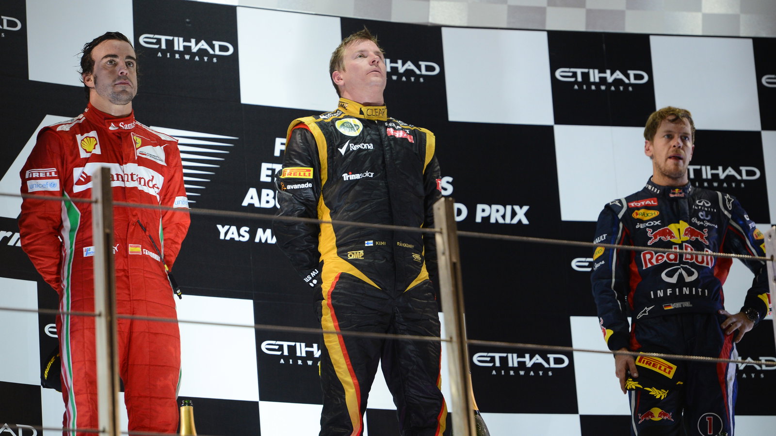 Podium: Kimi Raikkonen (FIN) Lotus F1 Team E20 (race winner), Fernando Alonso (ESP) Scuderia Ferrari