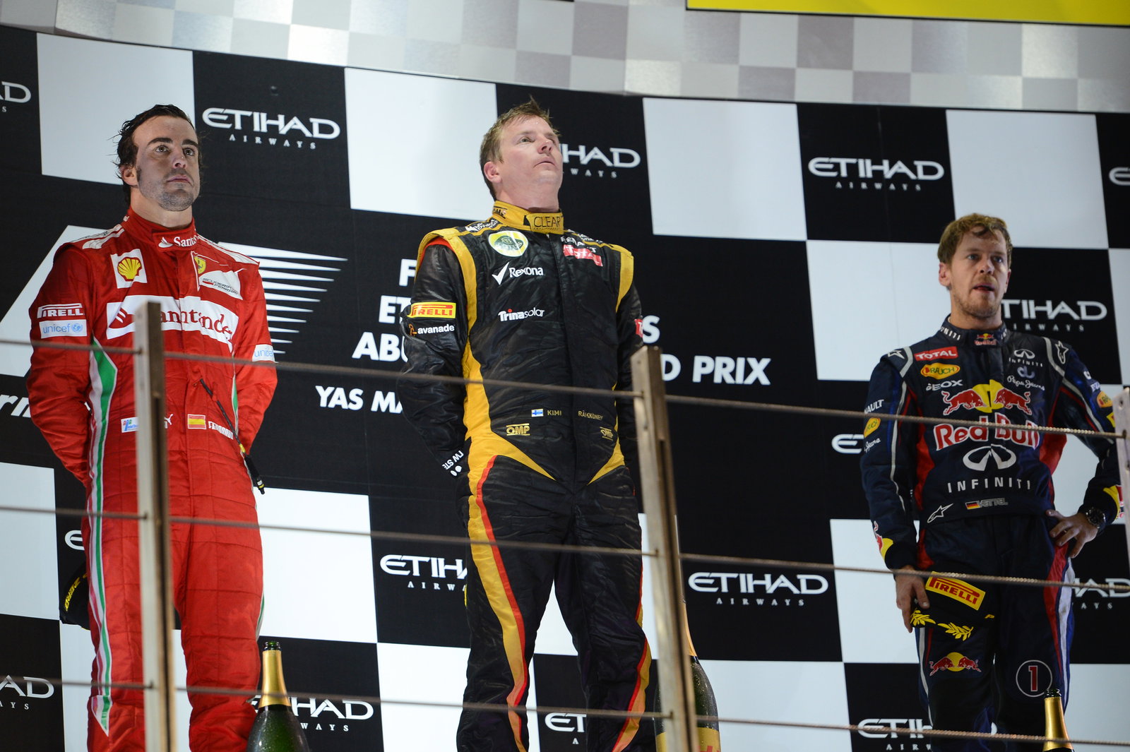 Podium: Kimi Raikkonen (FIN) Lotus F1 Team E20 (race winner), Fernando Alonso (ESP) Scuderia Ferrari