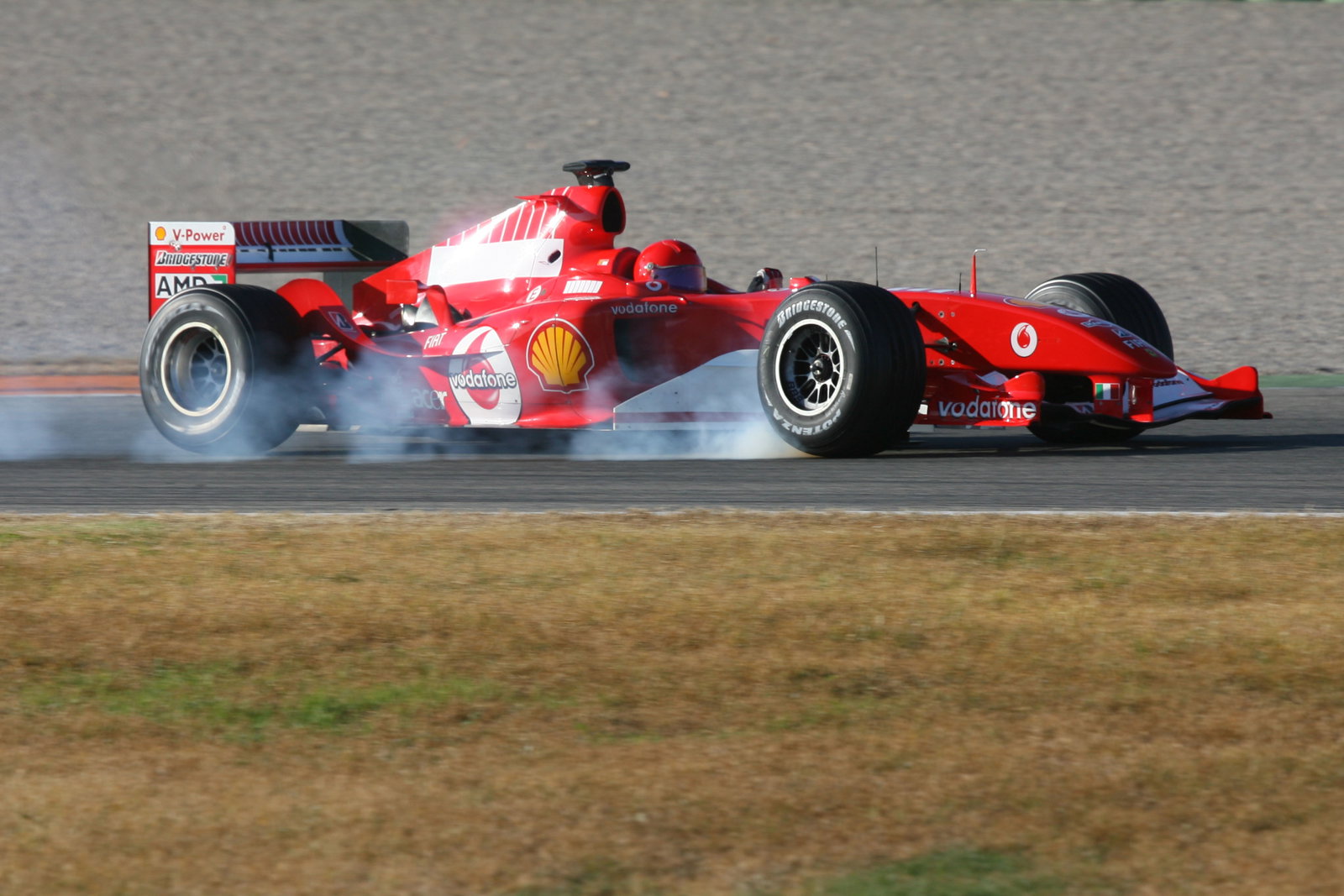 Valentino Rossi locks up the wheels in the Ferrari F2004