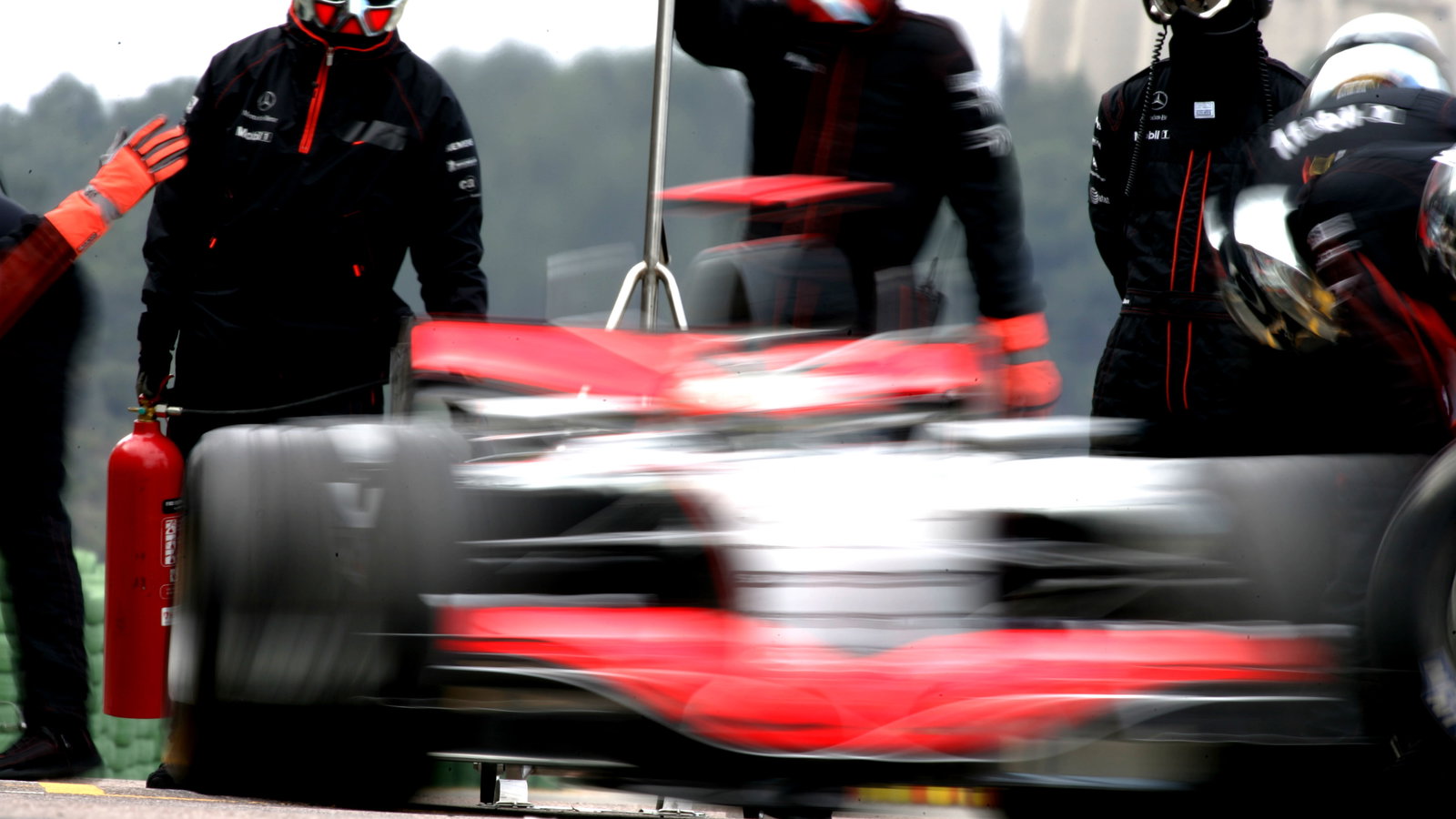 McLaren-Mercedes` Kimi Raikkonen practices pit-stops at the Valencia test