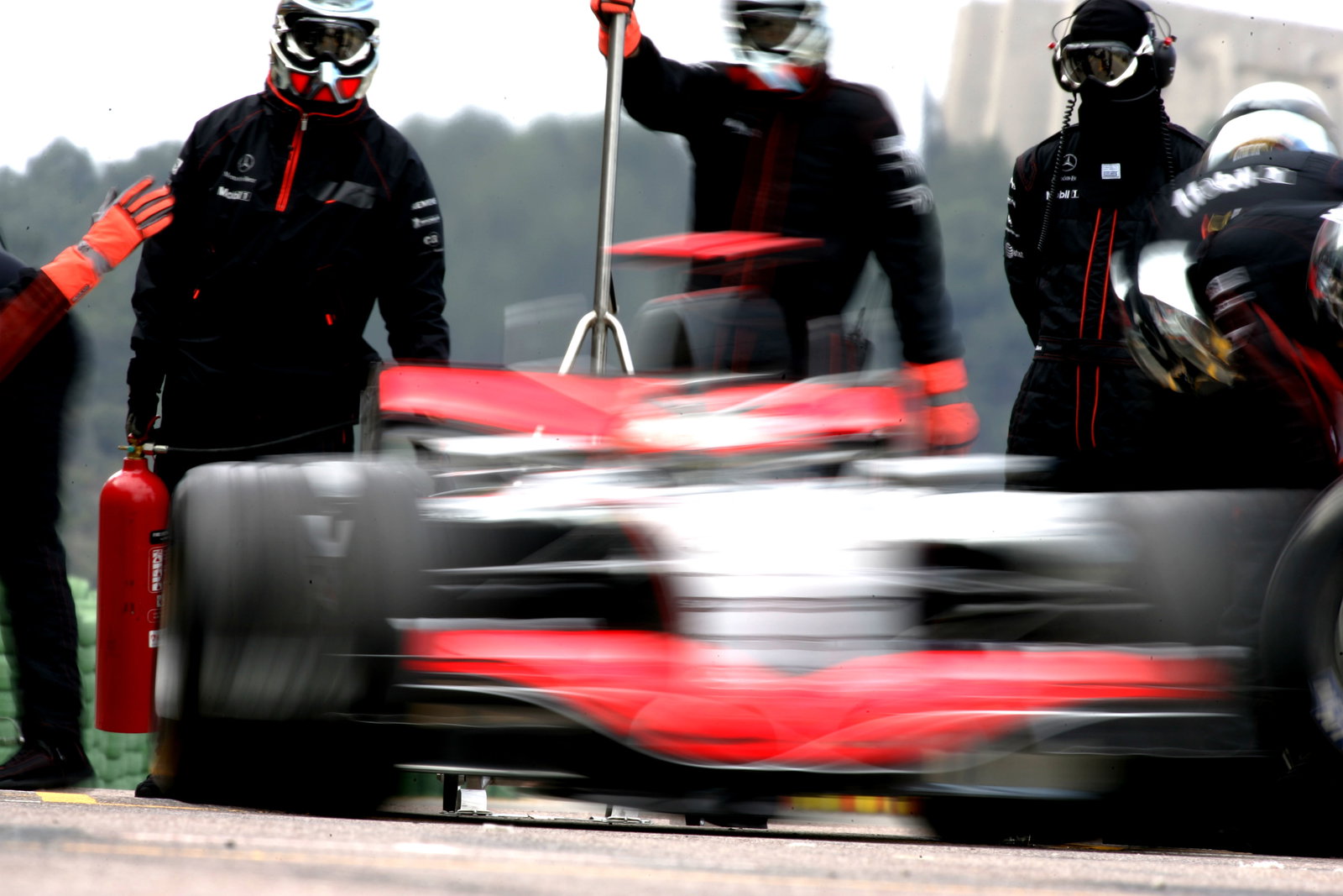 McLaren-Mercedes` Kimi Raikkonen practices pit-stops at the Valencia test