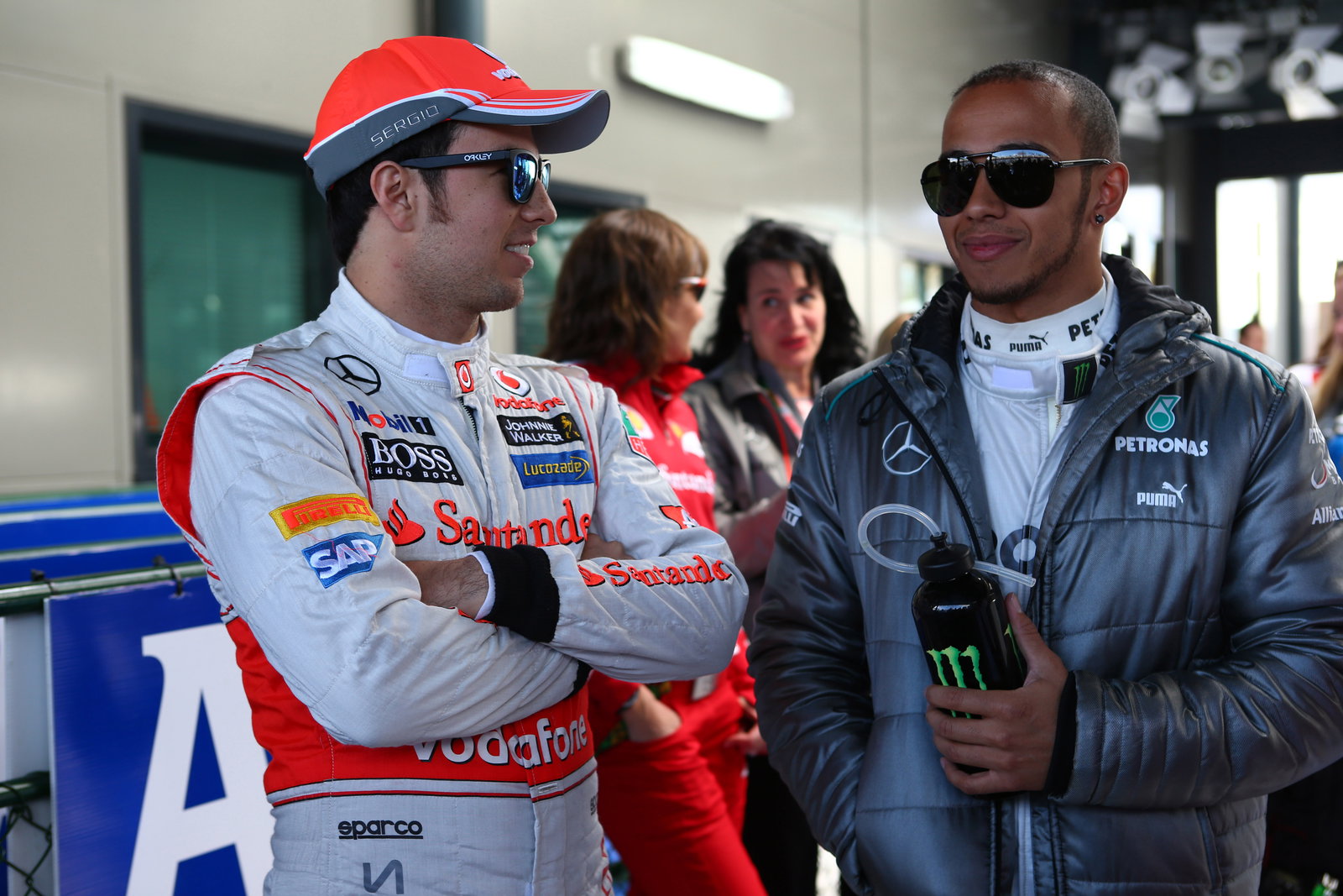 17.03.2013- Sergio Perez (MEX) McLaren MP4-28 and Lewis Hamilton (GBR) Mercedes AMG F1 W04