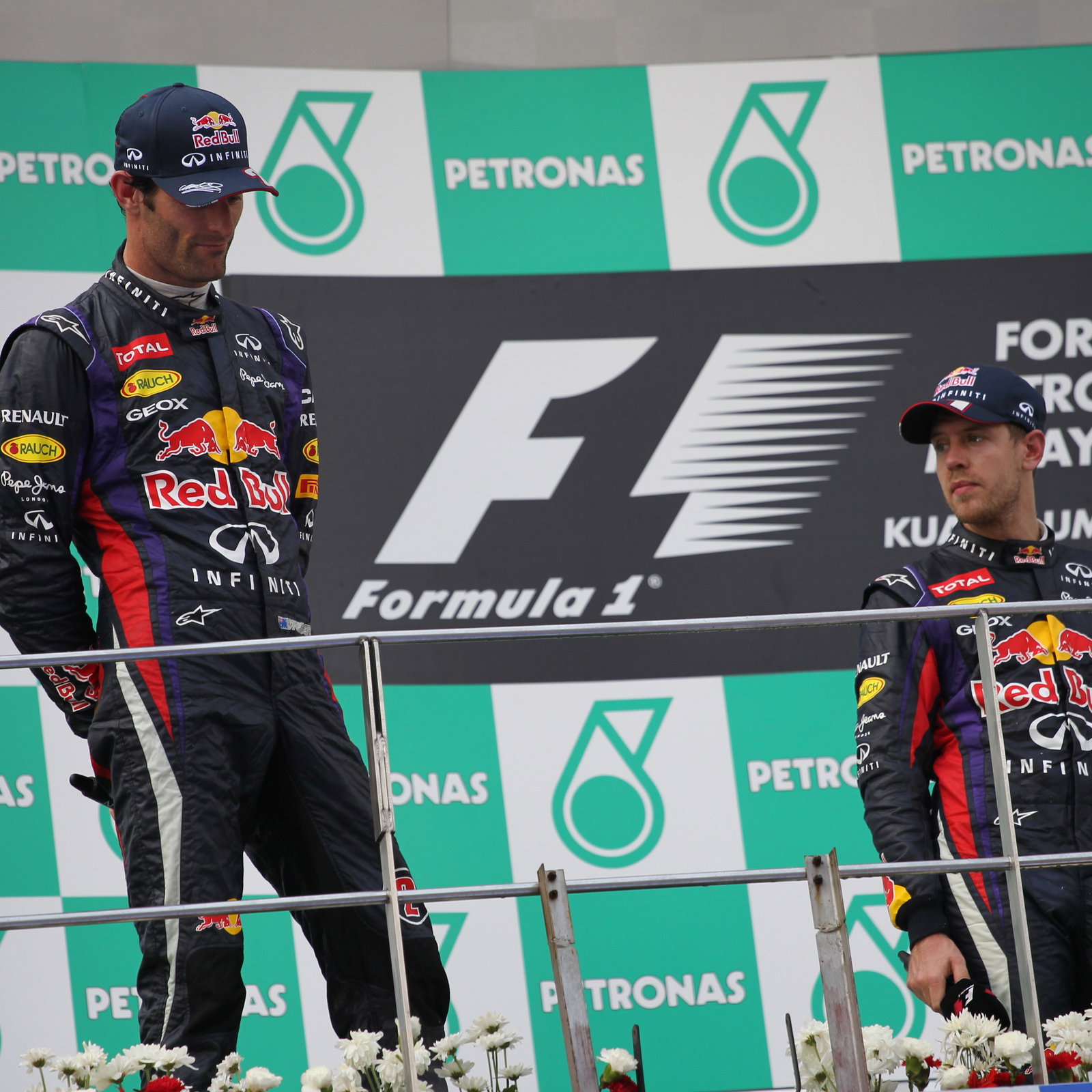 24.03.2013- Race, the podium; winner Sebastian Vettel (GER) Red Bull Racing RB9, 2nd Mark Webber (AU