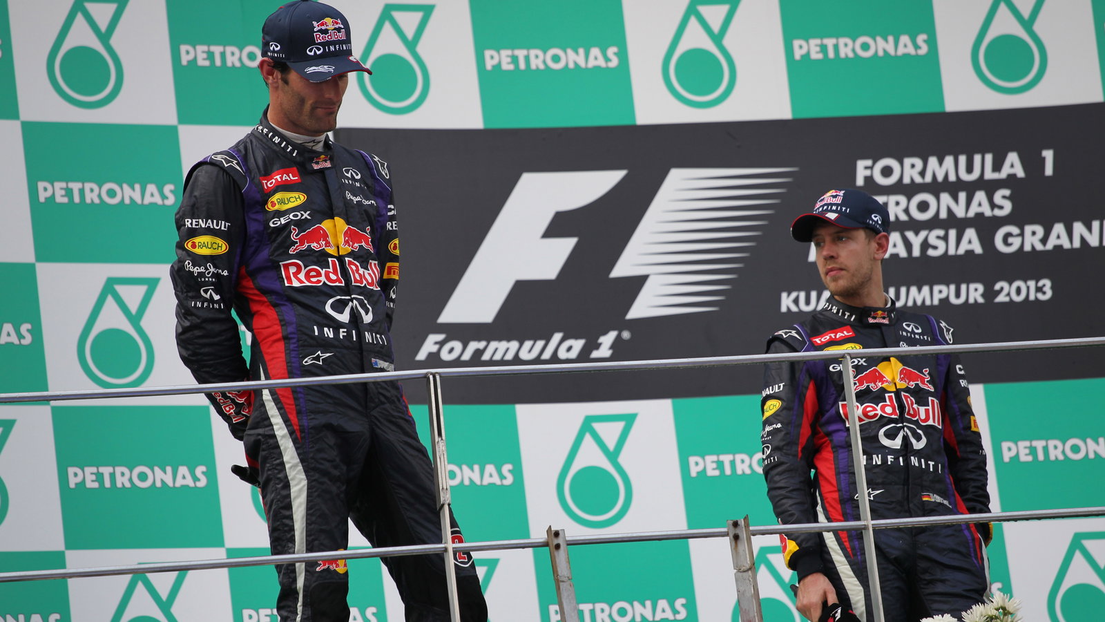 24.03.2013- Race, the podium; winner Sebastian Vettel (GER) Red Bull Racing RB9, 2nd Mark Webber (AU