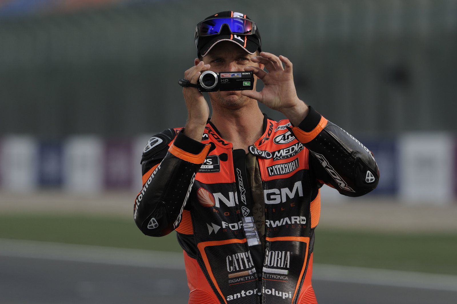 Edwards, filming on his camcorder, Qatar MotoGP 2013