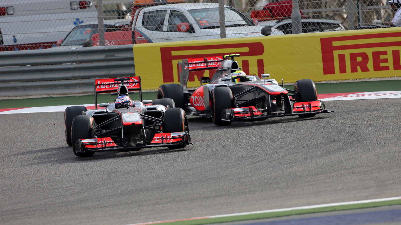 21.04.2013- Race, Jenson Button (GBR) McLaren Mercedes MP4-28 and Sergio Perez (MEX) McLaren MP4-28