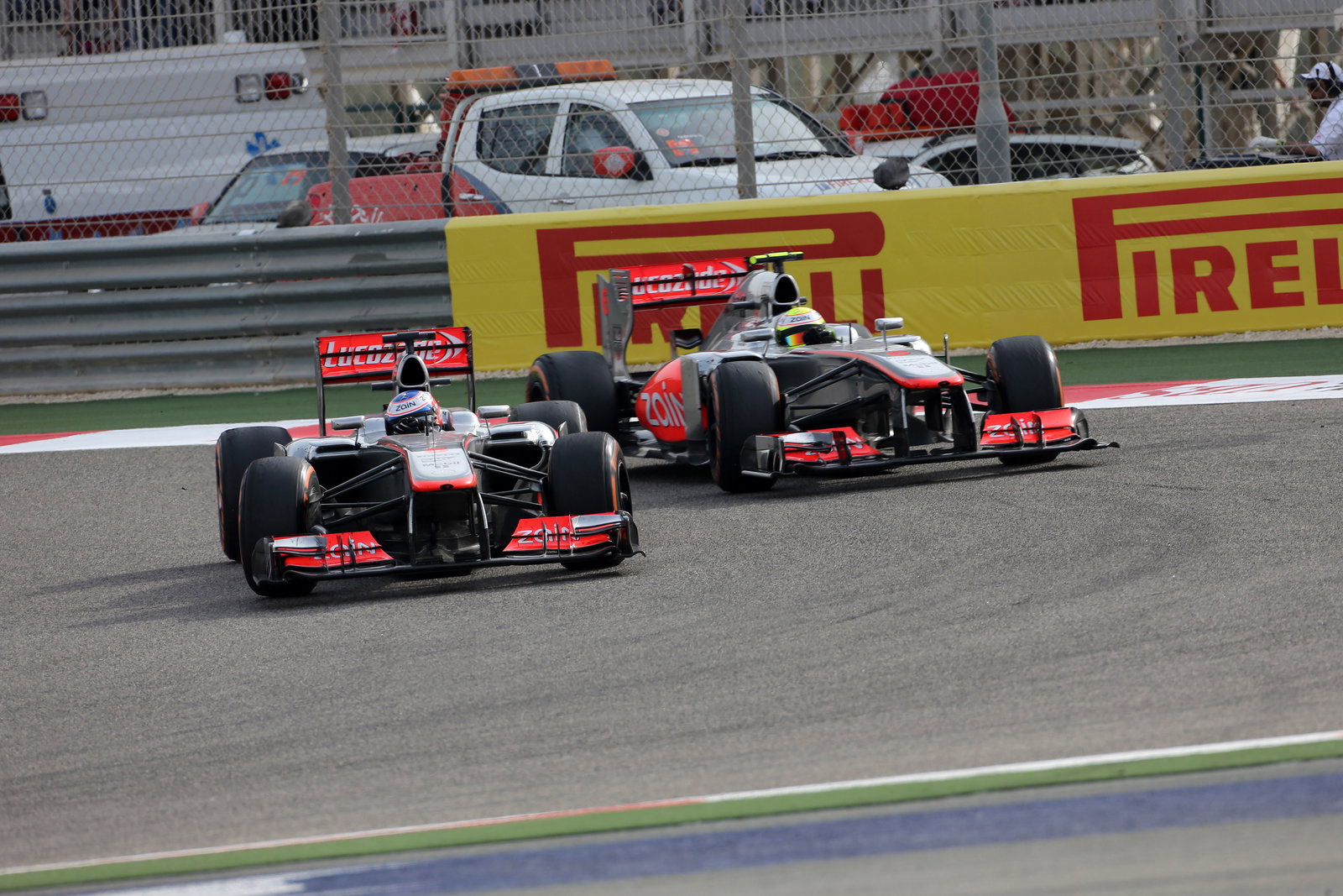 21.04.2013- Race, Jenson Button (GBR) McLaren Mercedes MP4-28 and Sergio Perez (MEX) McLaren MP4-28