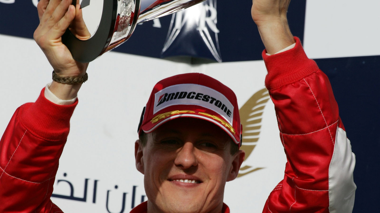 Ferrari`s Michael Schumacher celebrates his second place in Bahrain