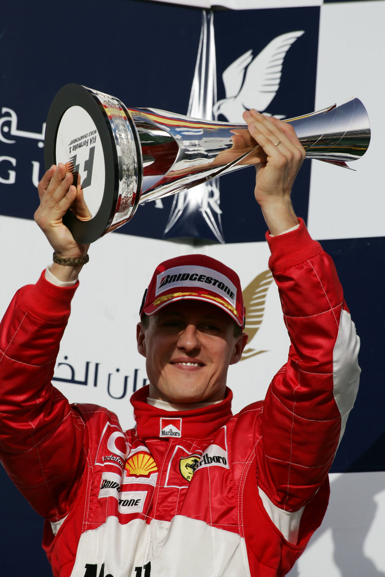 Ferrari`s Michael Schumacher celebrates his second place in Bahrain