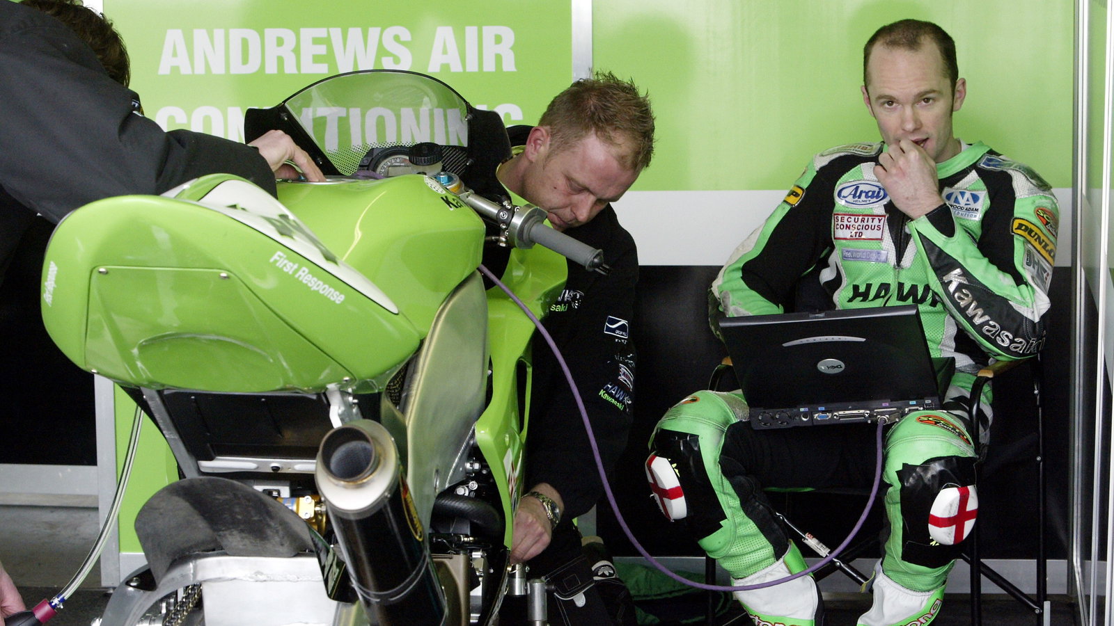 Scott Smart, Hawk Kawasaki ZX10R checks his bikes data on the computer in the pits.