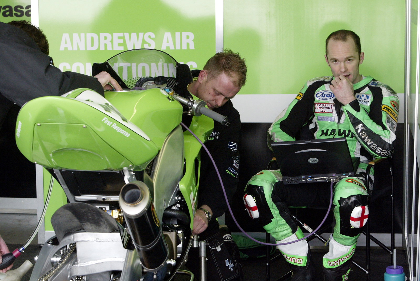 Scott Smart, Hawk Kawasaki ZX10R checks his bikes data on the computer in the pits.