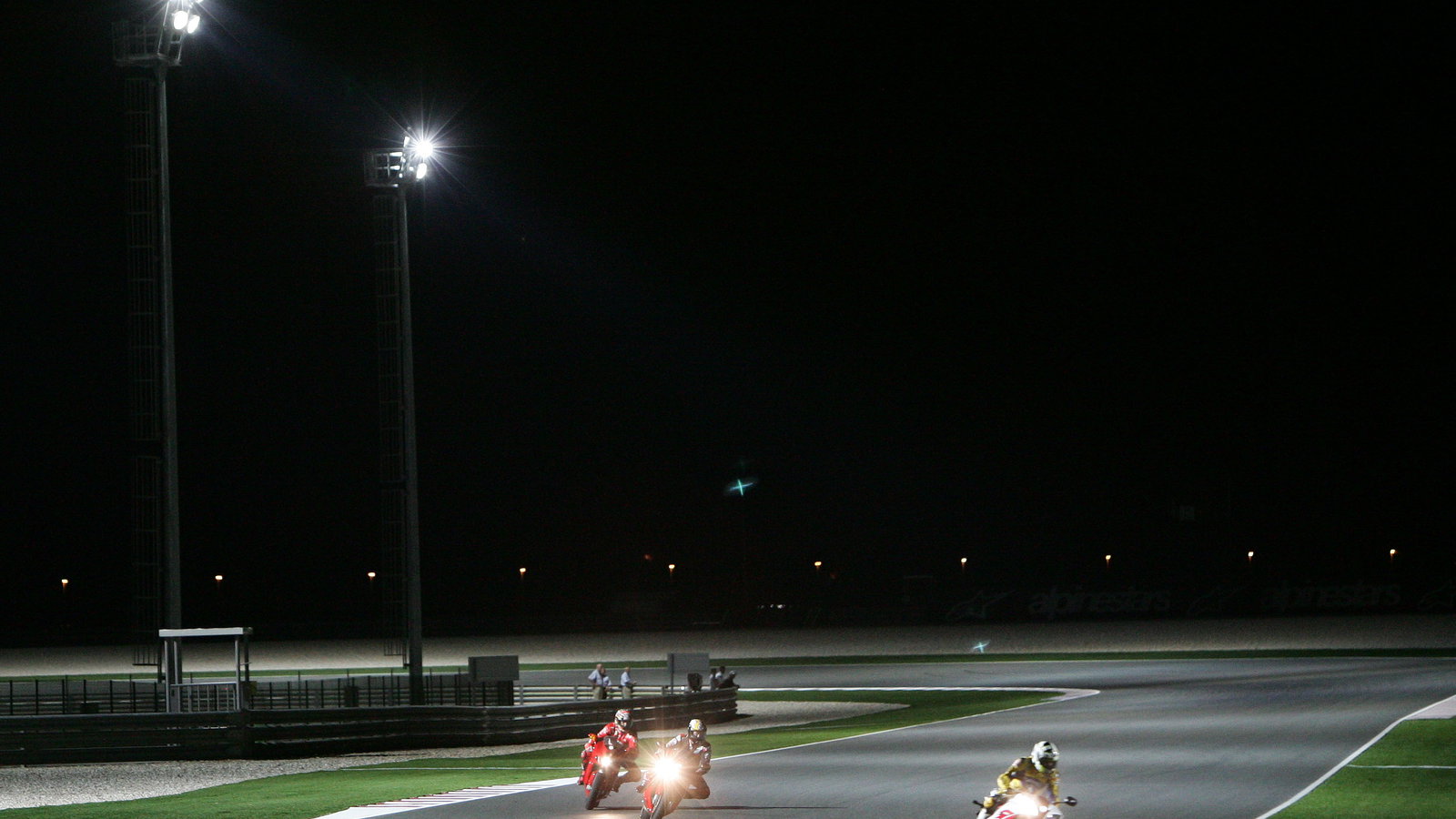 Rossi, Roberts and Capirossi try riding at night, Qatar MotoGP 2006