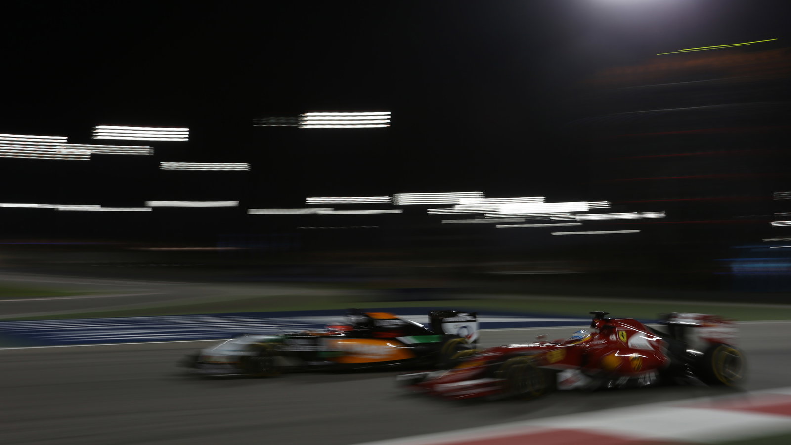04.04.2014- Free Practice 2, Fernando Alonso (ESP) Scuderia Ferrari F14T and Nico Hulkenberg (GER) S