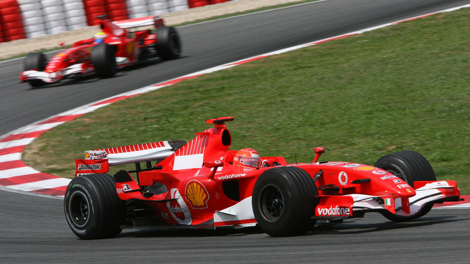 Michael Schumacher leads Felipe Massa