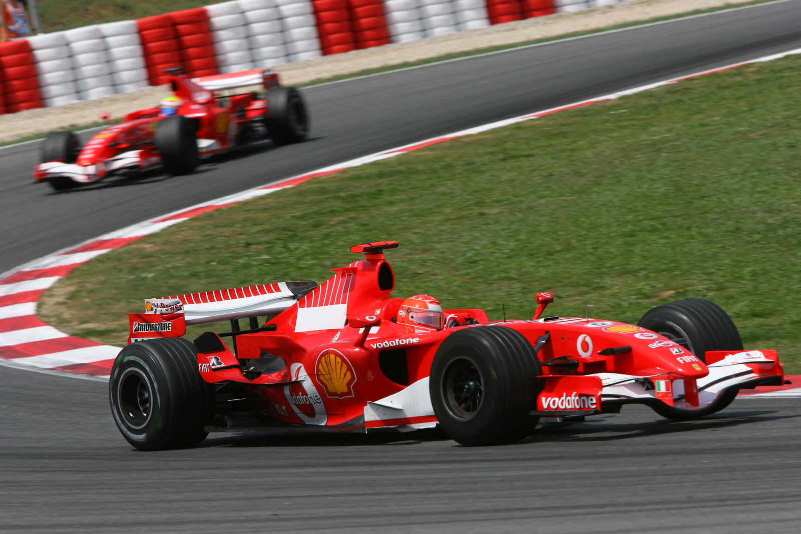 Michael Schumacher leads Felipe Massa
