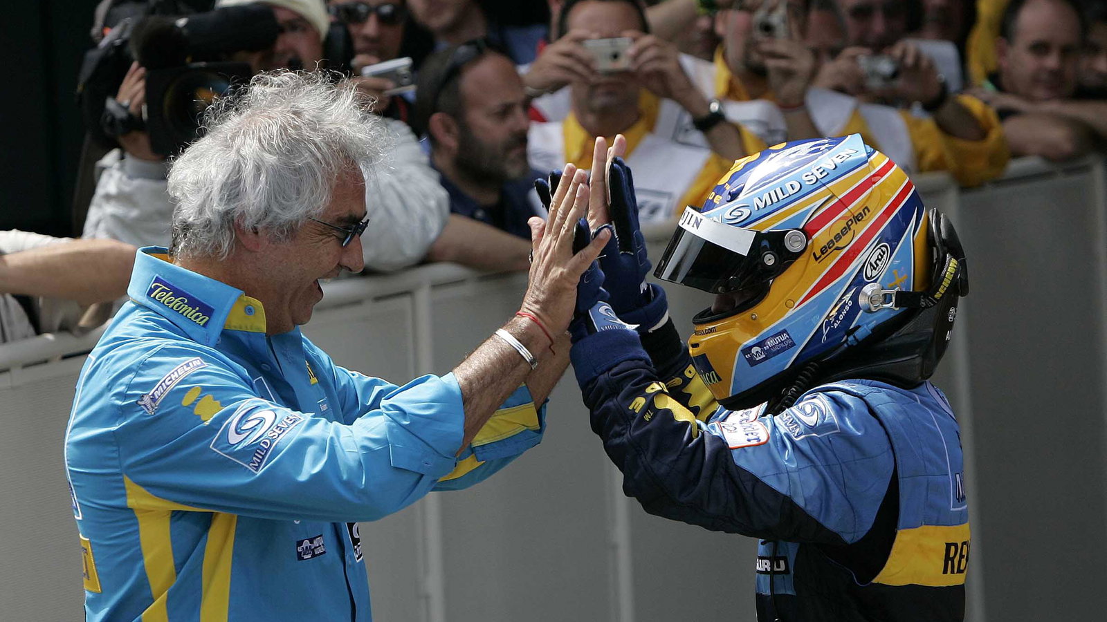 Renault`s Fernando Alonso celebrates his Spanish GP win with team boss, Flavio Briatore