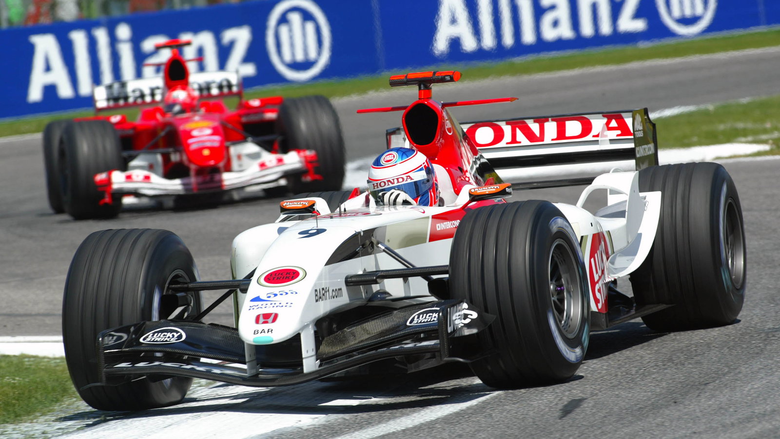 Jenson Button (BAR-Honda) leads Michael Schumacher (Ferrari) during the San Marino GP