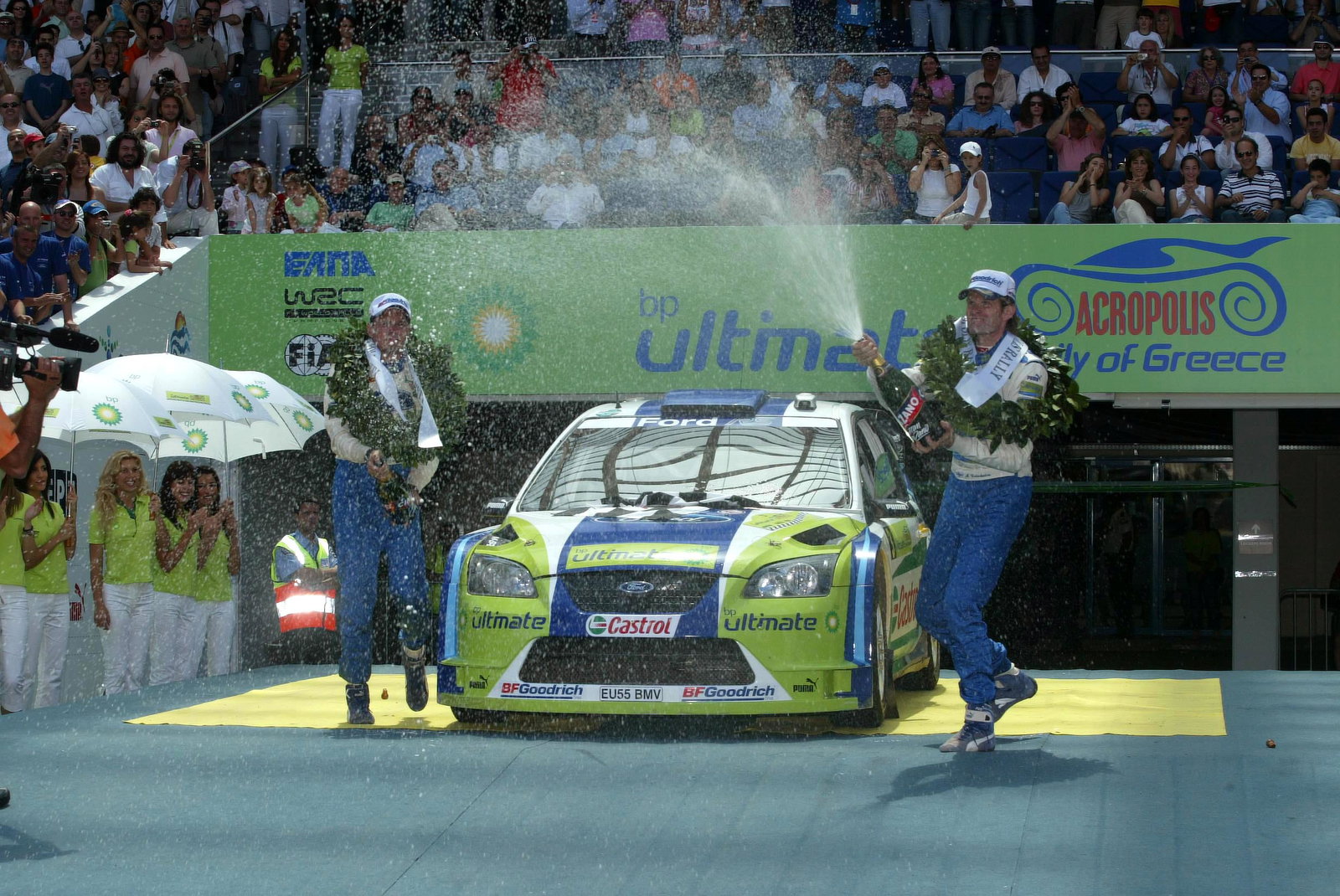 BP Ford`s Marcus Gronholm and co-driver, Timo Rautiainen celebrate their Acropolis Rally win