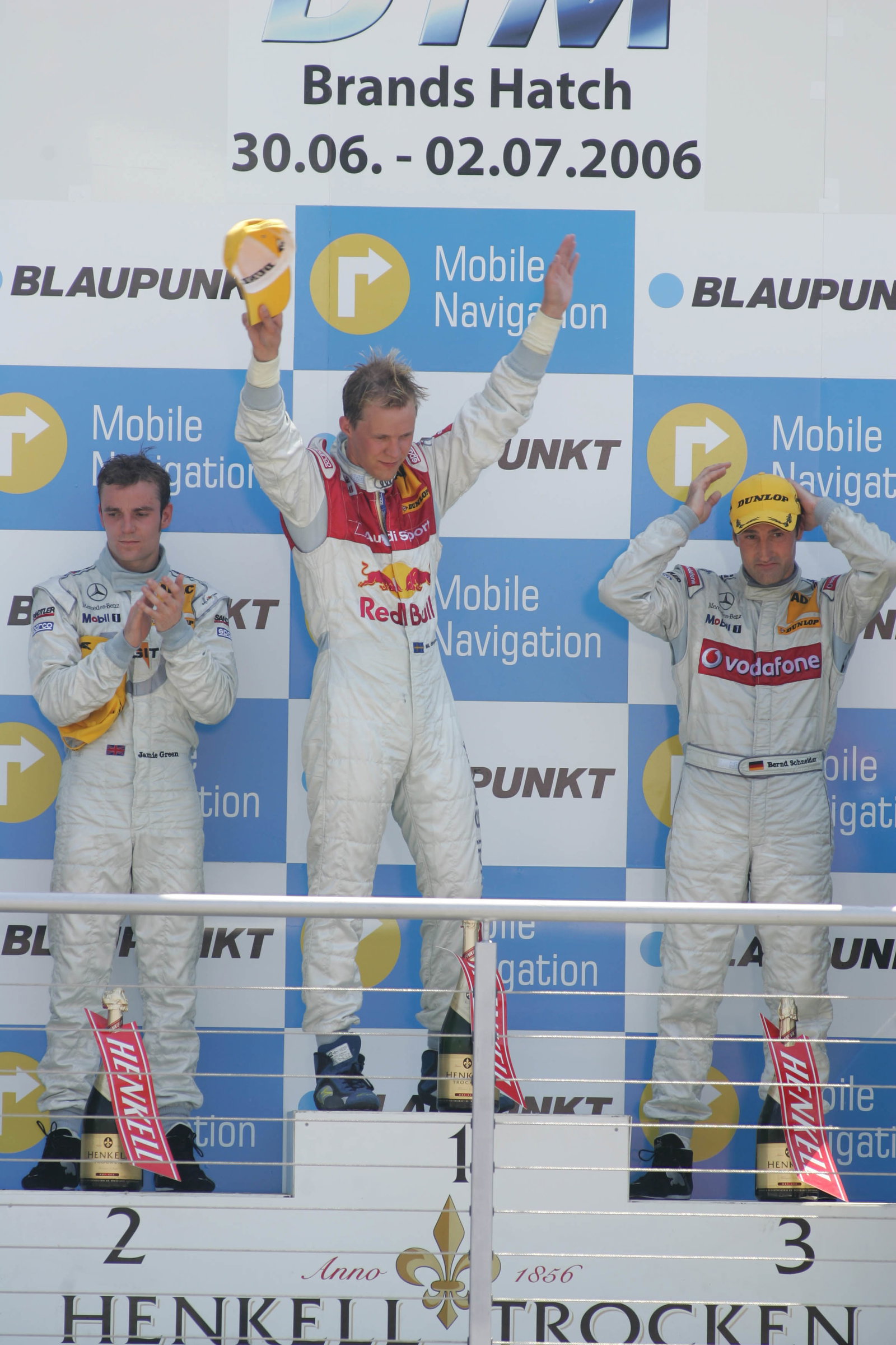 Podium L-R: Jamie Green (2nd), Mathias Ekstrom (winner), Bernd Schneider (3rd).DTM, Round 4, Brands 