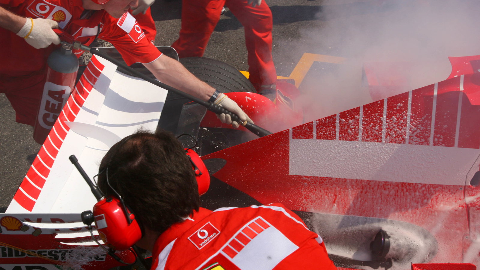15.07.2006 Magny Cours, France, Car of Michael Schumacher (GER), Scuderia Ferrari 248 F1, caught fir