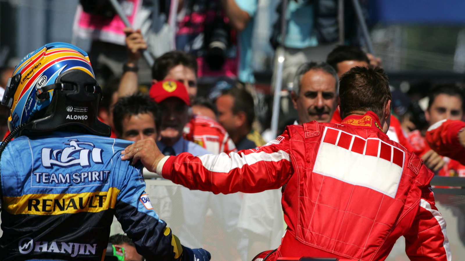 16.07.2006 Magny Cours, France, Fernando Alonso (ESP), Renault F1 Team, and Michael Schumacher (GER)