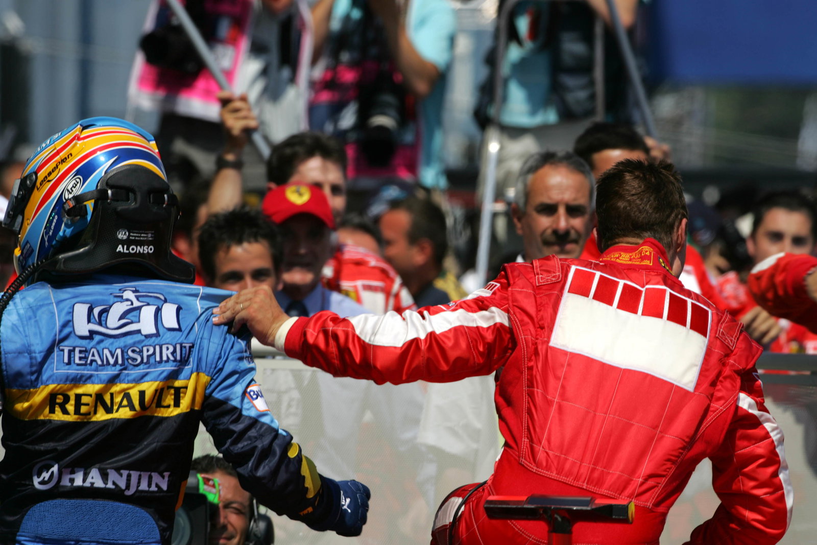 16.07.2006 Magny Cours, France, Fernando Alonso (ESP), Renault F1 Team, and Michael Schumacher (GER)