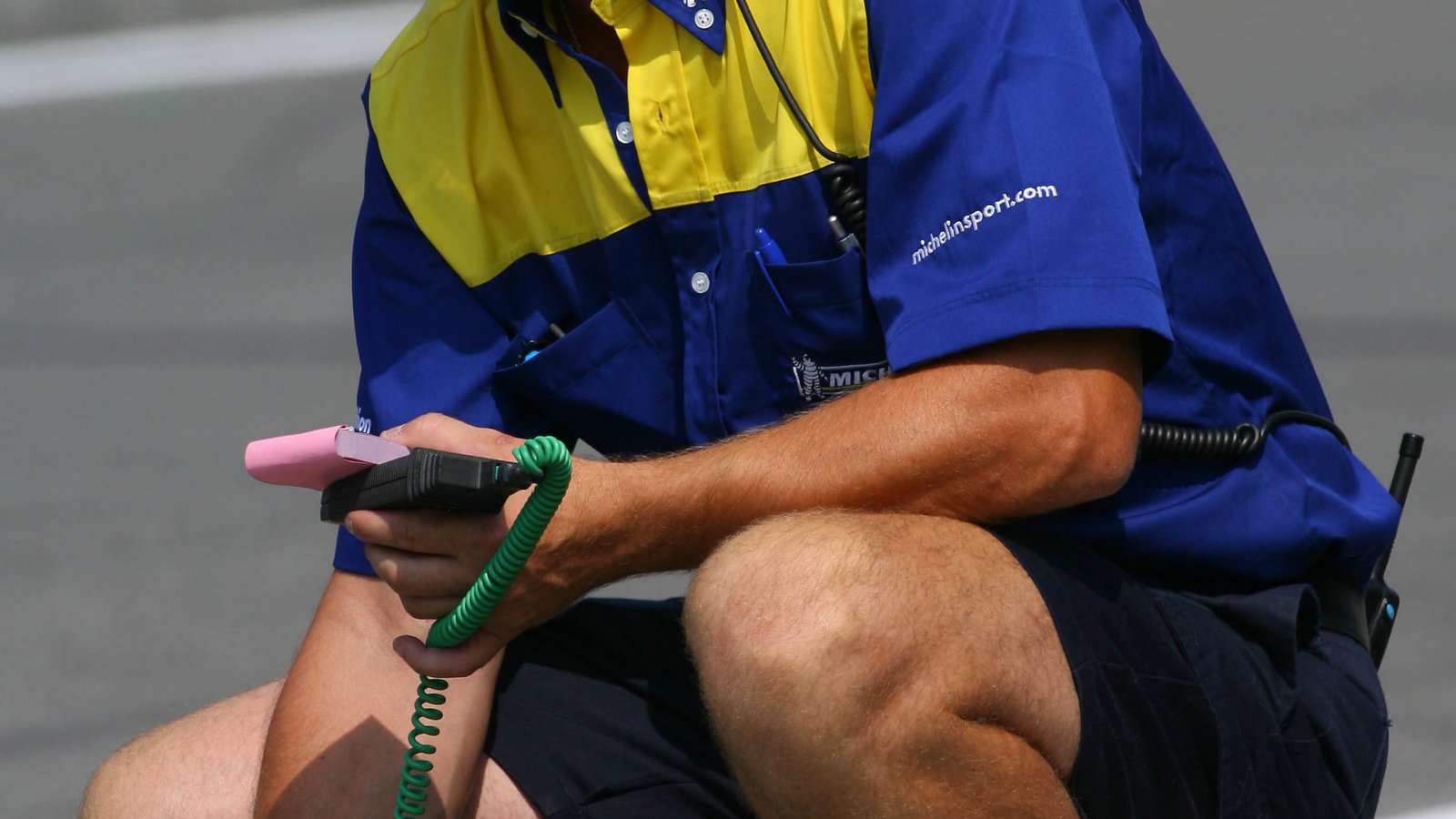 29.07.2006 Hockenheim, Germany, A Michelin Engineer checks the track temperature - Formula 1 World C