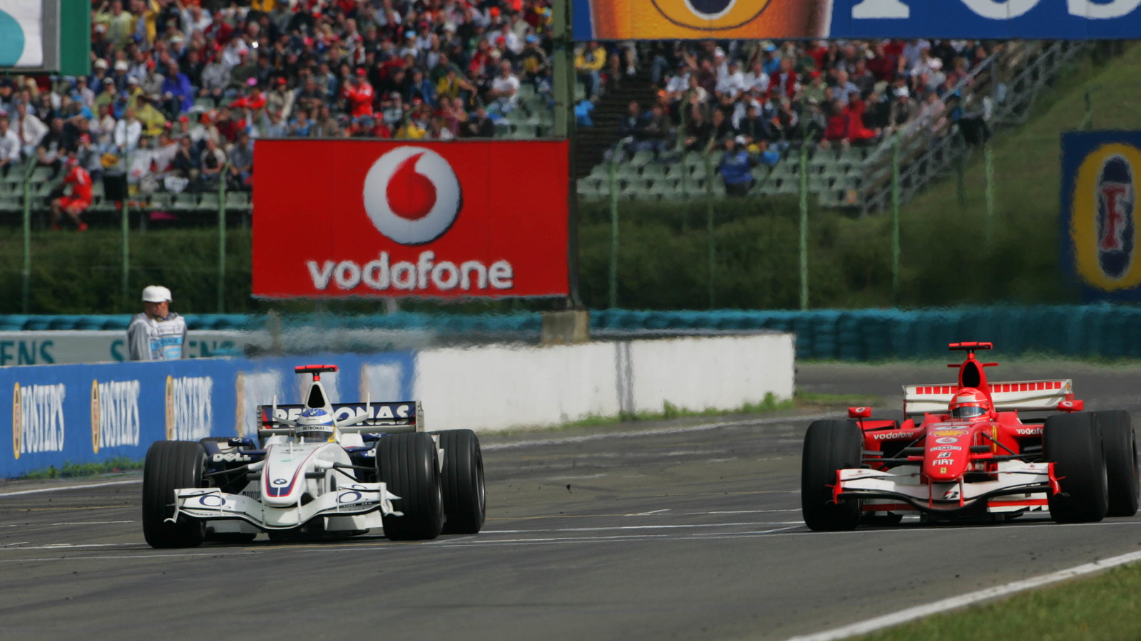 06.08.2006 Budapest, Hungary,
Nick Heidfeld (GER), BMW Sauber F1 Team, F1.06 and Michael Schumache