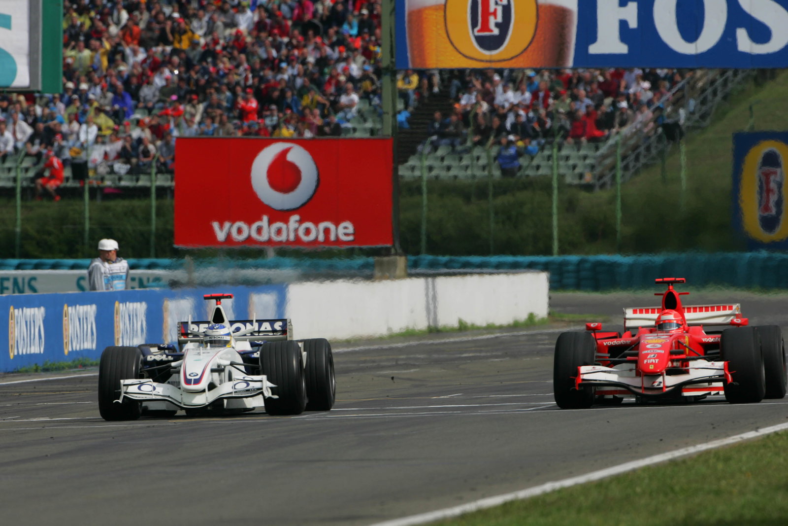 06.08.2006 Budapest, Hungary,
Nick Heidfeld (GER), BMW Sauber F1 Team, F1.06 and Michael Schumache