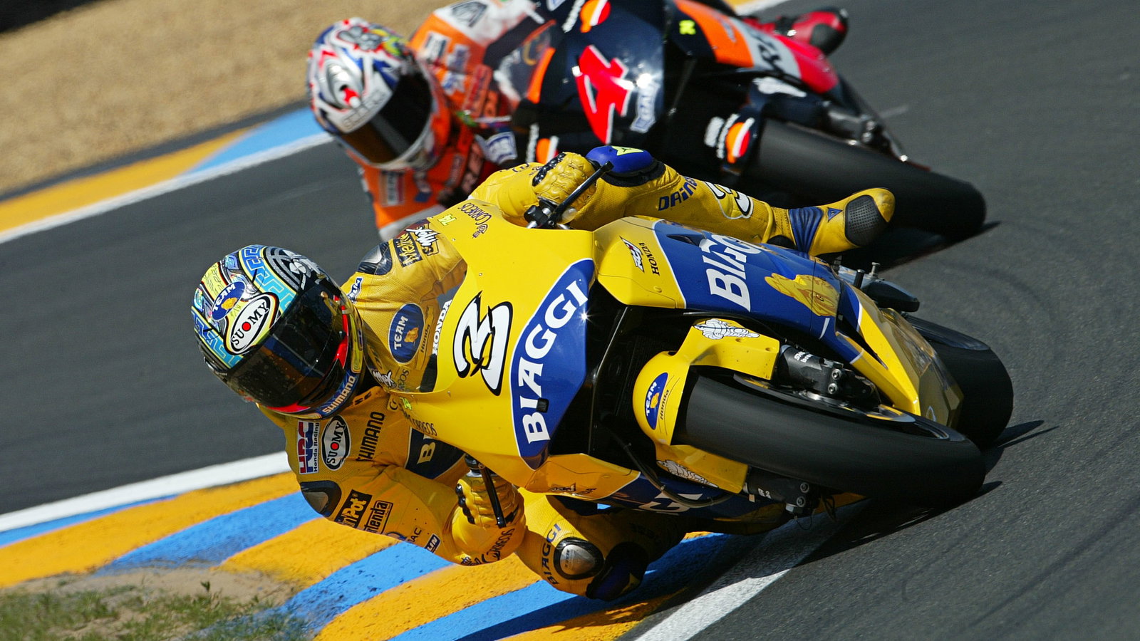 Biaggi and Barros, French MotoGP 2004