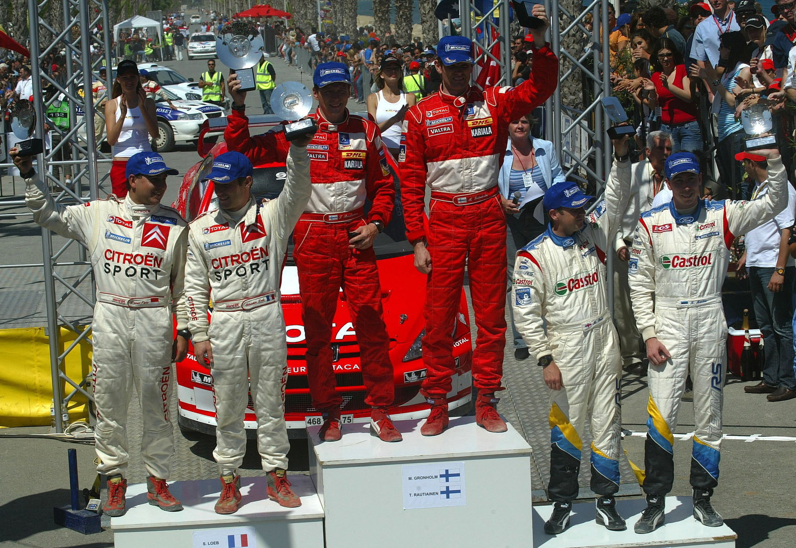 Cyprus Rally winners, Marcus Gronholm and Timo Rautiainen on the podium with Sebastian Loeb and Dani