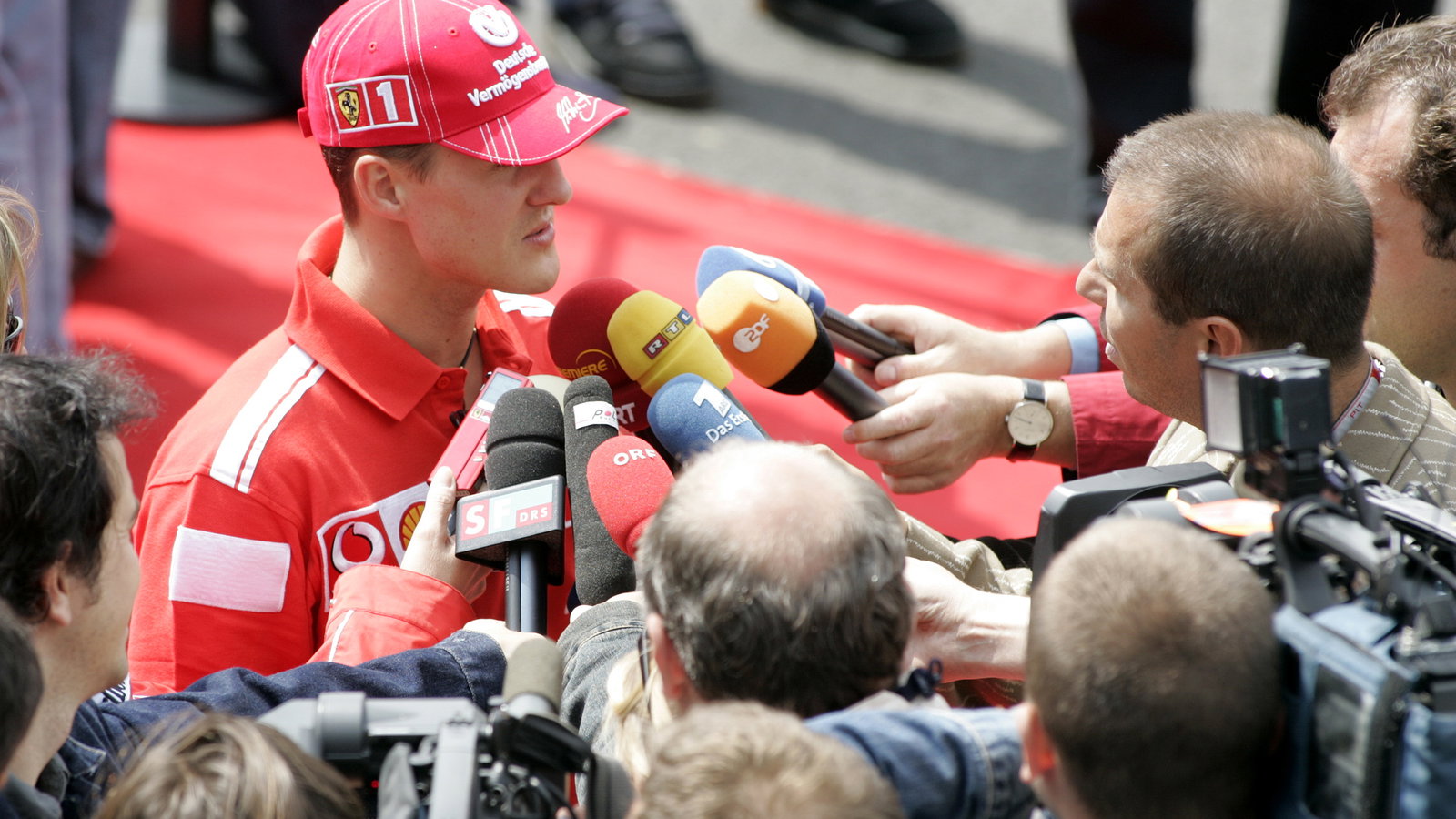 Michael Schumacher faces the media