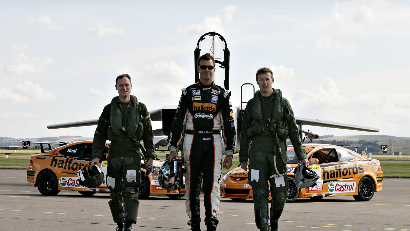 MATT NEAL RACES A RAF TORNADO JET AT LEUCHARS AIR BASE IN FIFE TODAY CO PILOTED BY HIS TEAM MATE GOR